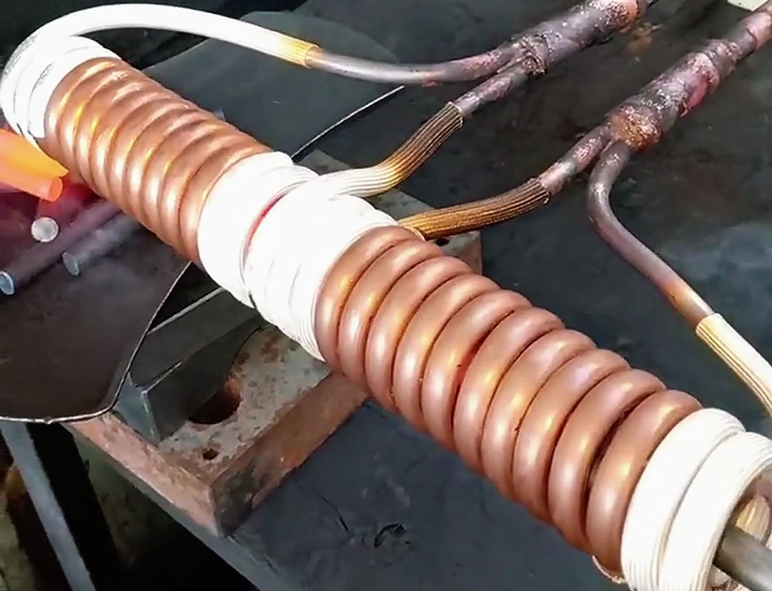 用高頻加熱機對金屬小棒在線加熱